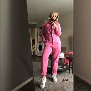 Pink denim jumpsuit with pockets
